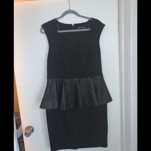 Black sleeveless peplum dress